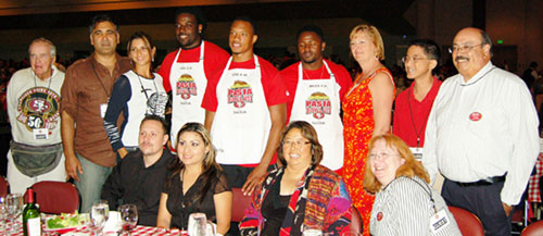 49ers Players Give Up Playbooks and Gridiron Gear for Aprons and Fun Times