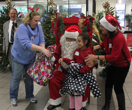 Rotary's Christmas for Kids Puts Big Smiles on Young Faces