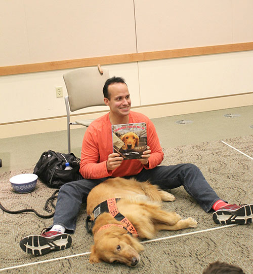 Former U.S. Army Captain and Service Dog Make Library Appearance