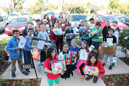 Sutter School Students Bring Holiday Donations to the JW House
