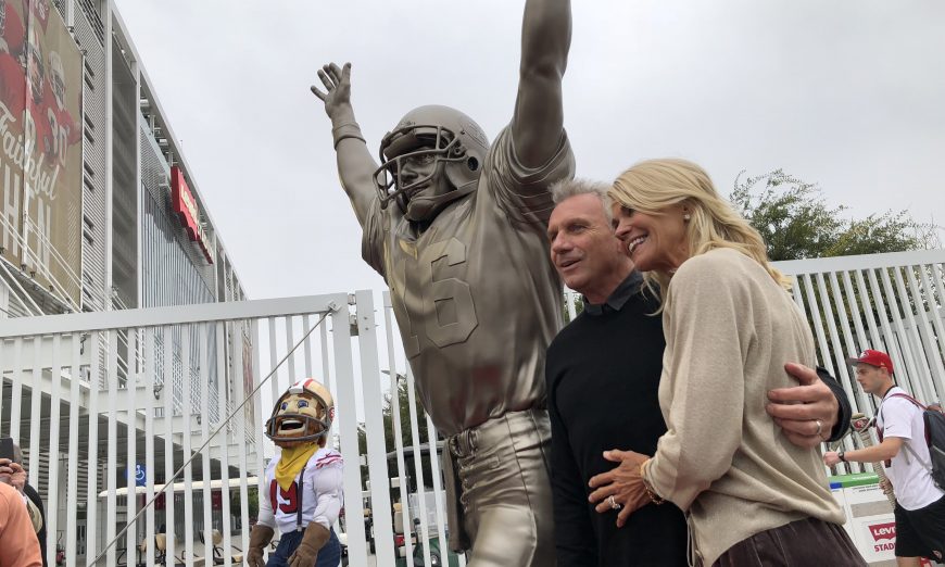 49ers Joe Montana and Wife Pose with The Catch Statue